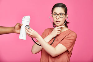 A nurse holding an Owala bottle for hydration