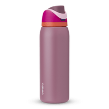 Full profile shot of the 40oz &#39;Crown Jewel&#39; FreeSip water bottle in pink and mauve.
